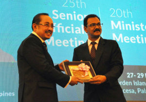 PHILIPPINE-MALAYSIA TIES Secretary Datu Hj. Abul Khayr Alonto, BIMP-EAGA Philippine signing minister and MinDA chairperson (left) hands over a token of appreciation to Dato Sri Devamany Krishnasamy,deputy minister in the Prime Minister's Department of Malaysia during the closing ceremony of the BIMP-EAGA 20th Ministerial Meeting held recently in Puerto Princesa City, Palawan, Philippines. More than 300 EAGA representatives convened during the event to discuss priority programs and socioeconomic projects aimed to enhance trade, tourism, and investments within the sub-region. Photo from www.minda