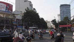 Crossing_a_Ho_Chi_Minh_City_Street_(12110595184)