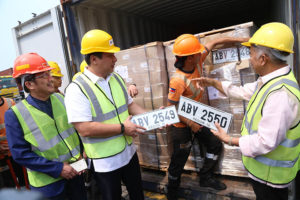 At the turnover of abandoned license plates were, left to right, Customs Revenue and Collection Monitoring Group deputy commissioner Arturo Lachica, Land Transportation Office chief Roberto Cabrera, and Customs Commissioner Alberto Lina.